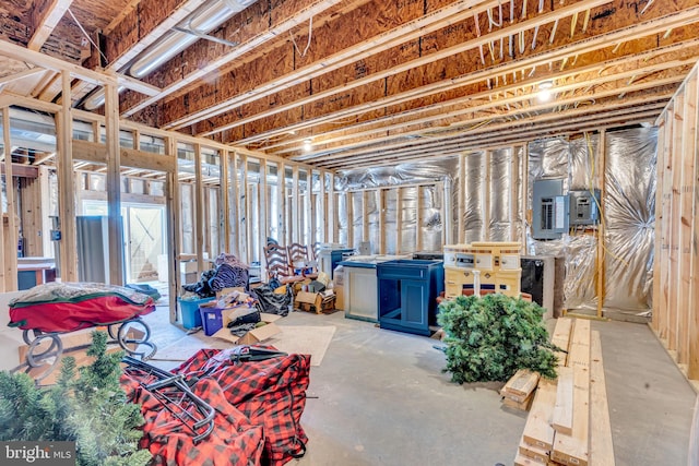 basement featuring plenty of natural light and electric panel