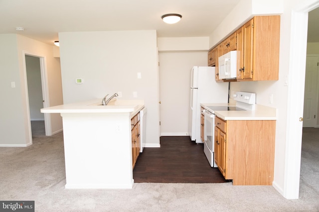 1615 Foxmeadow Cir Unit 1615, Royersford, PA 19468 - kitchen with white appliances, dark carpet, a peninsula, and light countertops
