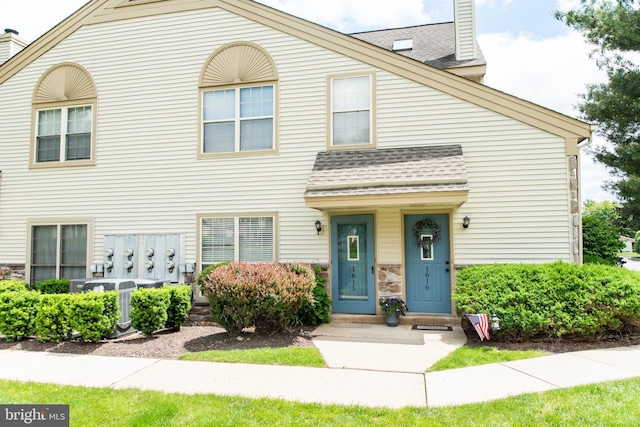 1615 Foxmeadow Cir Unit 1615, Royersford, PA 19468 - multi unit property with roof with shingles and a chimney