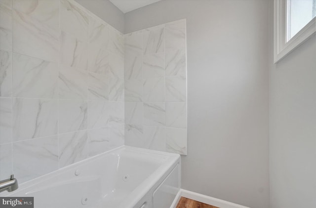 137 S Main St, Yoe, PA 17313 - bathroom with a whirlpool tub, baseboards, and wood finished floors