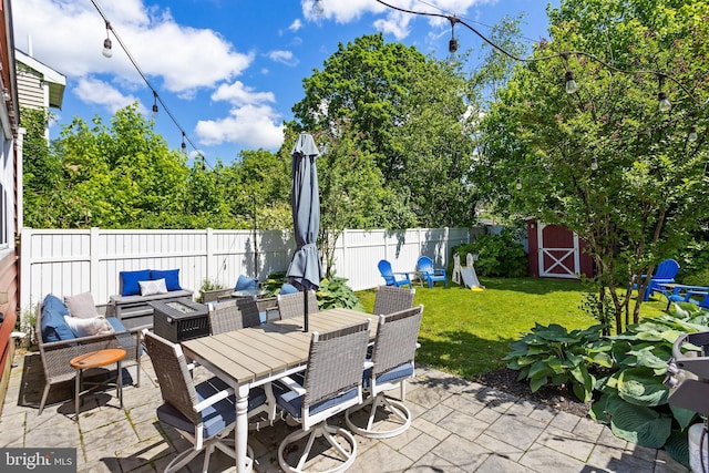 163 2nd St, Bordentown, NJ 08505 - view of patio with a storage unit, an outdoor hangout area, and an outdoor structure