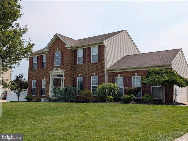 1781 Cobblestone Ln, Vineland, NJ 08361 - view of front of home with a front yard, brick siding, and roof with shingles