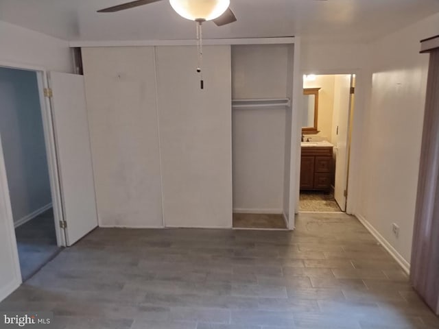 2841 Aquarius Ave, Silver Spring, MD 20906 - unfurnished bedroom featuring connected bathroom, a ceiling fan, and wood finished floors