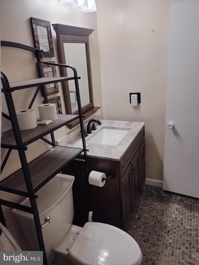 2841 Aquarius Ave, Silver Spring, MD 20906 - bathroom with vanity, toilet, and baseboards