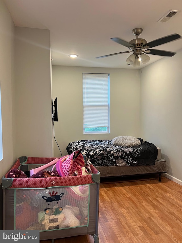 3431 N 19th St, Philadelphia, PA 19140 - bedroom with wood finished floors and ceiling fan