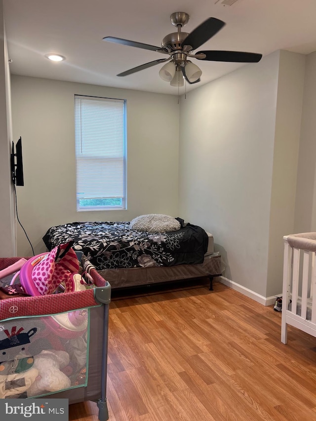 3431 N 19th St, Philadelphia, PA 19140 - bedroom with light wood-style flooring, baseboards, a ceiling fan, and recessed lighting