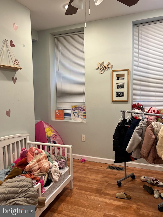 3431 N 19th St, Philadelphia, PA 19140 - bedroom with wood finished floors, baseboards, and ceiling fan