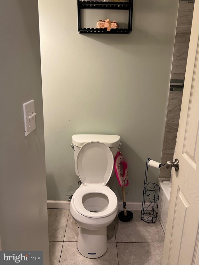 3431 N 19th St, Philadelphia, PA 19140 - full bath with tile patterned floors, toilet, and baseboards