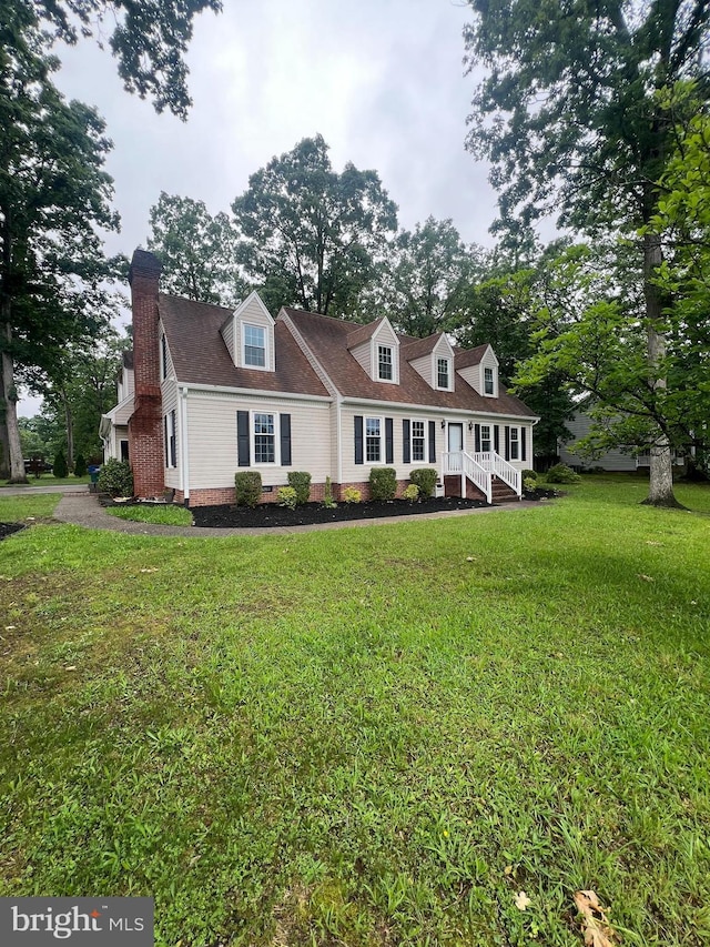 22 Braddock Dr, Fredericksburg, VA 22405 - cape cod home featuring a front yard, a chimney, and crawl space
