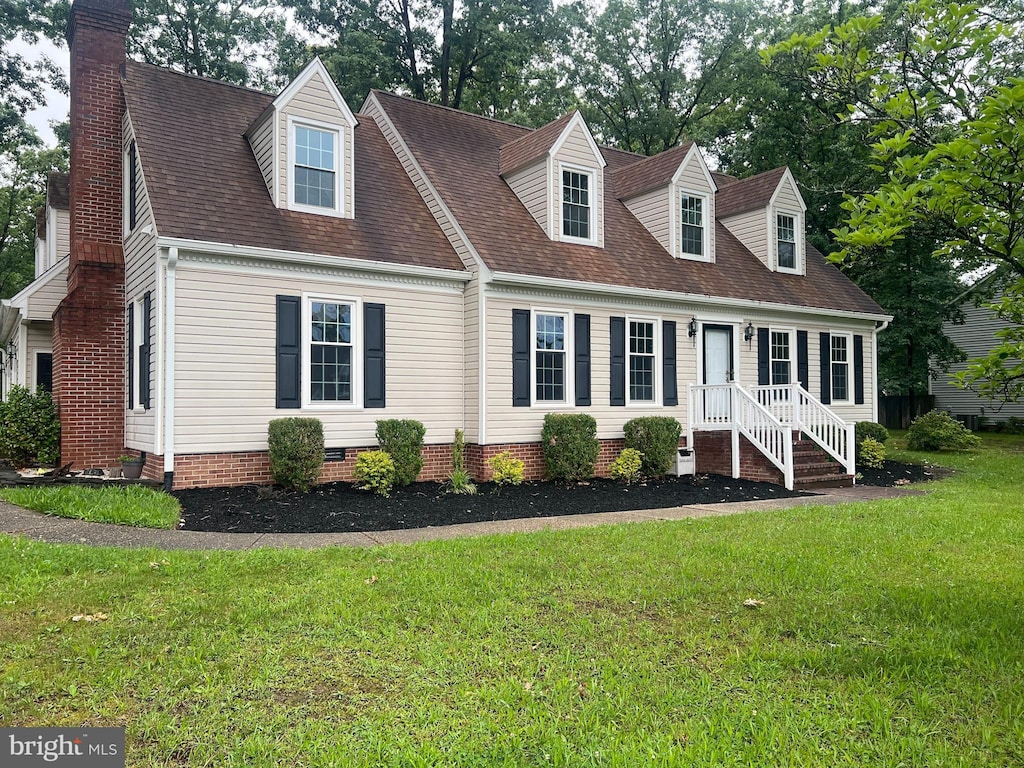 22 Braddock Dr, Fredericksburg, VA 22405 - new england style home featuring a front yard, a chimney, crawl space, and roof with shingles