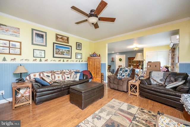 1341 Westview Xing, Grantsville, MD 21536 - living area featuring ceiling fan, a wall mounted air conditioner, crown molding, wainscoting, and wood finished floors