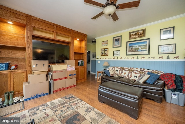 1341 Westview Xing, Grantsville, MD 21536 - living room featuring crown molding, a ceiling fan, wainscoting, and light wood finished floors