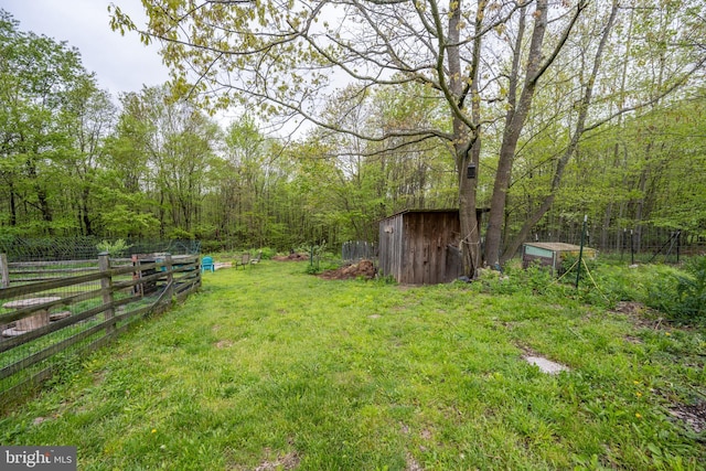 1341 Westview Xing, Grantsville, MD 21536 - view of yard featuring a shed, an outdoor structure, and a forest view