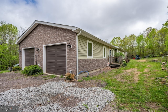 1341 Westview Xing, Grantsville, MD 21536 - view of side of home with brick siding and a garage