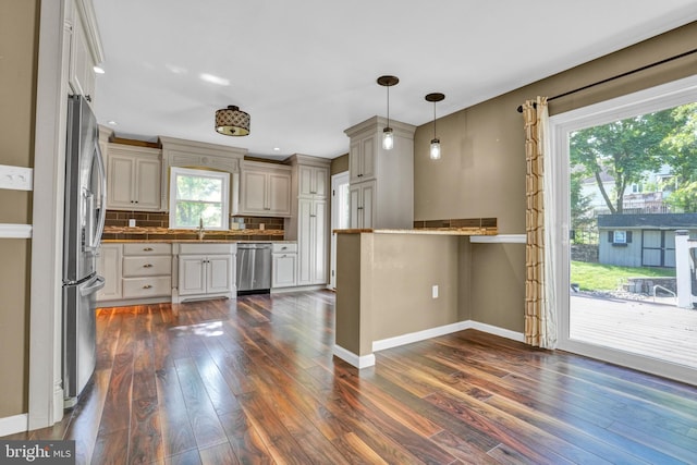 40 Steeple Ct, Reinholds, PA 17569 - kitchen featuring stainless steel appliances, plenty of natural light, dark wood-style floors, and tasteful backsplash