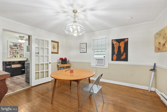 904 W Burke St, Martinsburg, WV 25401 - dining room with hardwood / wood-style floors, a baseboard heating unit, ornamental molding, a chandelier, and cooling unit