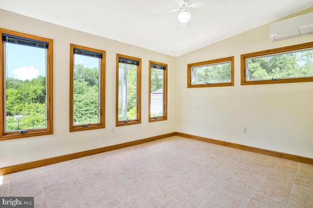 22350 Old Hundred Rd, Barnesville, MD 20838 - empty room with an AC wall unit, healthy amount of natural light, vaulted ceiling, and baseboards