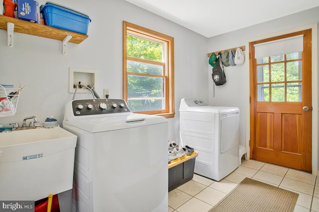 22350 Old Hundred Rd, Barnesville, MD 20838 - laundry room featuring washing machine and dryer and light tile patterned flooring
