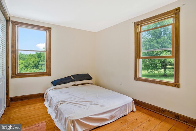 22350 Old Hundred Rd, Barnesville, MD 20838 - bedroom featuring baseboards and light wood finished floors