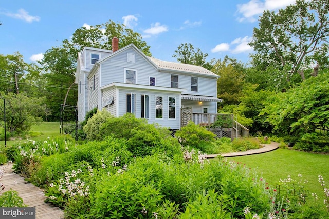 22350 Old Hundred Rd, Barnesville, MD 20838 - back of house featuring a deck and a chimney