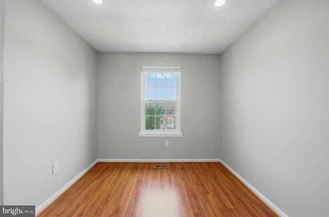 1252 Knoll Mist Ln, Gaithersburg, MD 20879 - empty room with wood finished floors and recessed lighting
