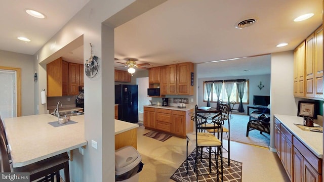 14701 Viewcrest Rd SW, Cresaptown, MD 21502 - kitchen with black appliances, a sink, light countertops, a ceiling fan, and recessed lighting