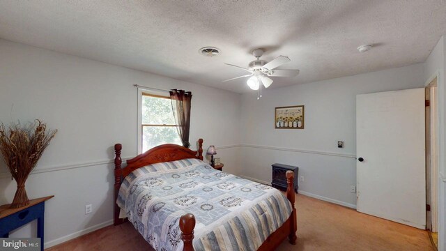14701 Viewcrest Rd SW, Cresaptown, MD 21502 - carpeted bedroom featuring baseboards, a textured ceiling, and a ceiling fan