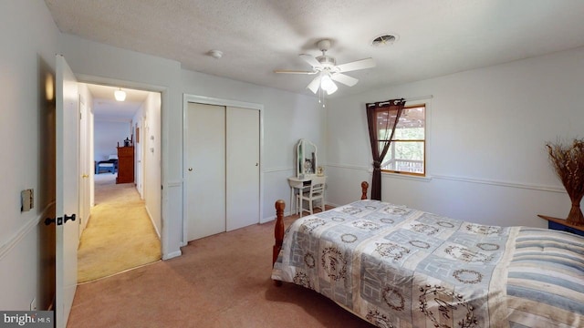 14701 Viewcrest Rd SW, Cresaptown, MD 21502 - bedroom with light colored carpet, a closet, and a ceiling fan