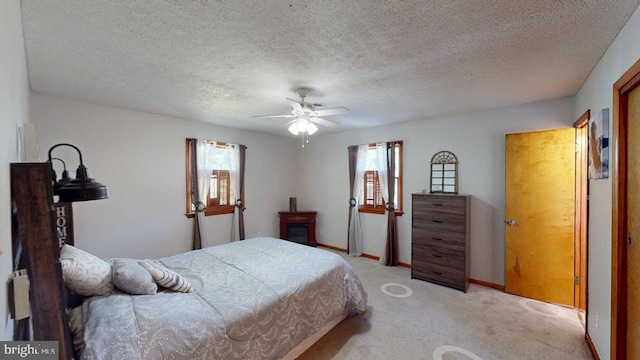 14701 Viewcrest Rd SW, Cresaptown, MD 21502 - bedroom with light carpet, baseboards, a ceiling fan, and a textured ceiling