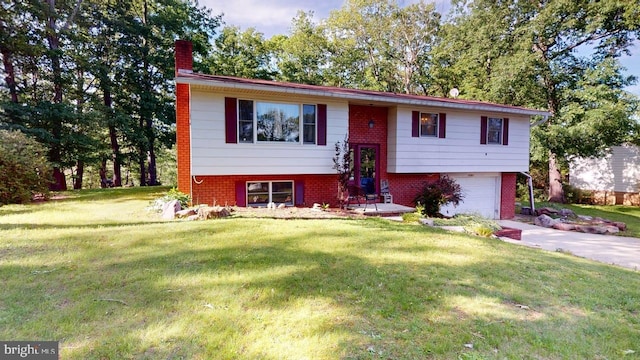 14701 Viewcrest Rd SW, Cresaptown, MD 21502 - bi-level home with a chimney, an attached garage, a front yard, and brick siding