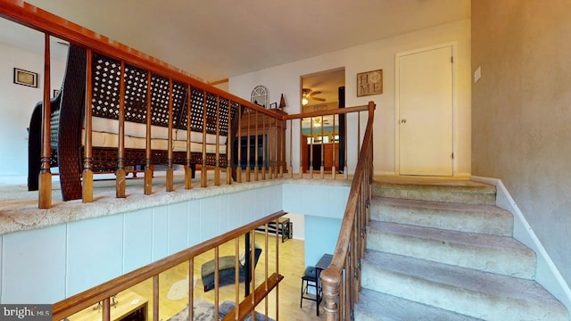 14701 Viewcrest Rd SW, Cresaptown, MD 21502 - stairway featuring ceiling fan, baseboards, and carpet floors