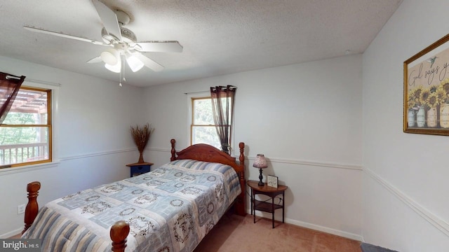 14701 Viewcrest Rd SW, Cresaptown, MD 21502 - carpeted bedroom with a textured ceiling, a ceiling fan, and baseboards