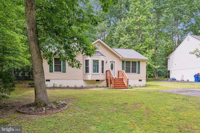 721 Canterbury Dr, Ruther Glen, VA 22546 - view of front of property featuring crawl space and a front yard