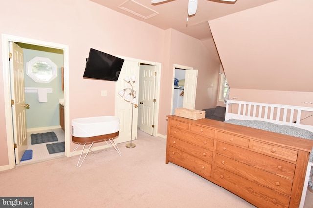 6 Quincy Ct, Ocean Pines, MD 21811 - bedroom with light carpet, lofted ceiling, baseboards, connected bathroom, and a closet