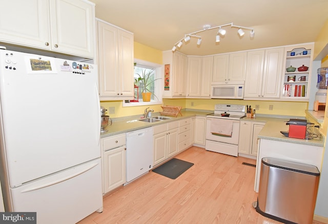6 Quincy Ct, Ocean Pines, MD 21811 - kitchen featuring white appliances, a sink, light wood-style floors, white cabinets, and light countertops