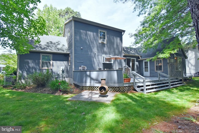 6 Quincy Ct, Ocean Pines, MD 21811 - back of house featuring a lawn, a deck, and roof with shingles