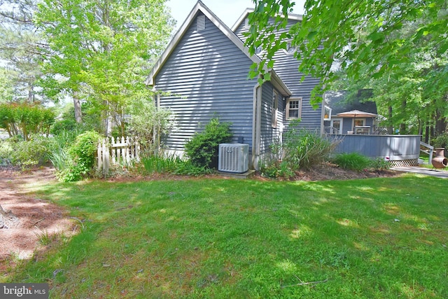 6 Quincy Ct, Ocean Pines, MD 21811 - view of property exterior featuring central AC unit and a wooden deck