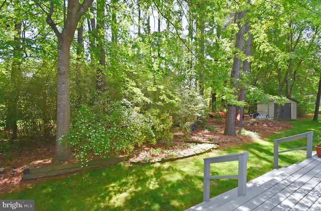 6 Quincy Ct, Ocean Pines, MD 21811 - view of green lawn with a deck