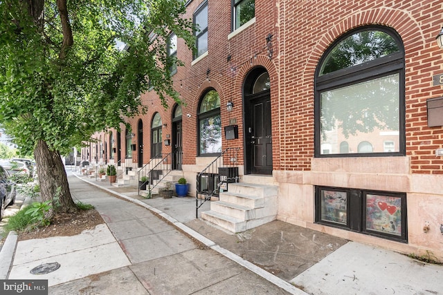 814 N Patterson Park Ave, Baltimore, MD 21205 - view of exterior entry featuring brick siding