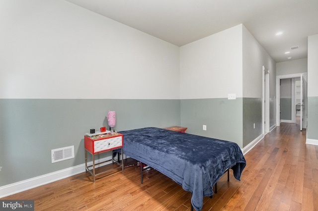 814 N Patterson Park Ave, Baltimore, MD 21205 - bedroom featuring baseboards, hardwood / wood-style floors, and recessed lighting