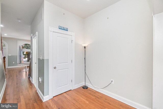 814 N Patterson Park Ave, Baltimore, MD 21205 - corridor with light wood-style flooring, baseboards, and recessed lighting