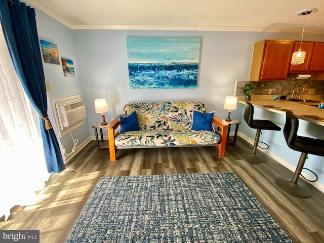 202 32nd St Unit 309, Ocean City, MD 21842 - living room with crown molding, wood finished floors, baseboards, and a wall mounted air conditioner