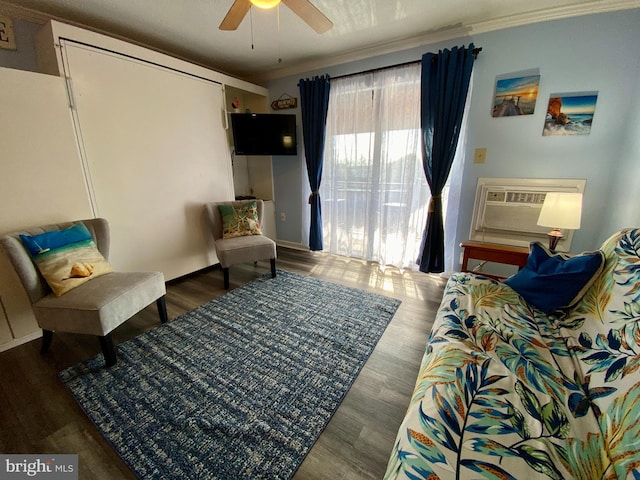 202 32nd St Unit 309, Ocean City, MD 21842 - bedroom with ornamental molding, an AC wall unit, wood finished floors, a ceiling fan, and baseboards