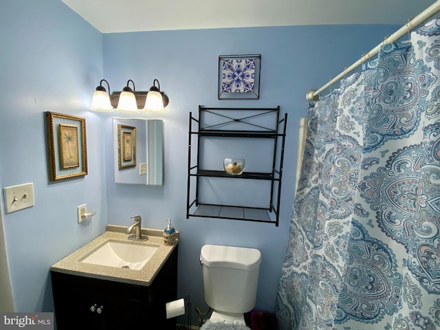 202 32nd St Unit 309, Ocean City, MD 21842 - full bathroom featuring toilet, vanity, and curtained shower