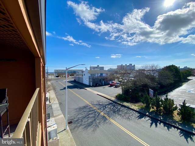 202 32nd St Unit 309, Ocean City, MD 21842 - view of asphalt street with street lights, a view of city, curbs, and sidewalks