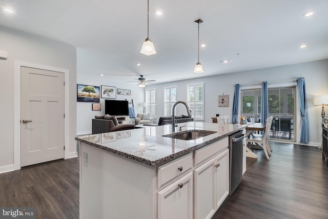 10104 Dressage Dr, Upper Marlboro, MD 20772 - kitchen featuring a sink, dark wood-type flooring, stainless steel dishwasher, white cabinetry, and a ceiling fan