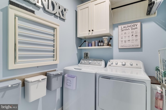 10104 Dressage Dr, Upper Marlboro, MD 20772 - laundry room with washing machine and clothes dryer and cabinet space
