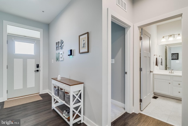 10104 Dressage Dr, Upper Marlboro, MD 20772 - foyer entrance with wood finished floors and baseboards