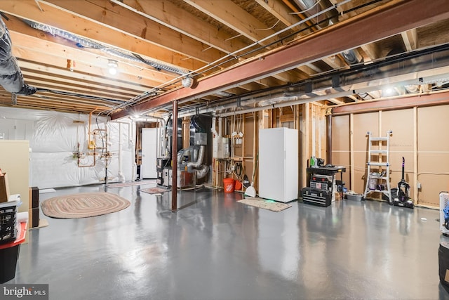 10104 Dressage Dr, Upper Marlboro, MD 20772 - unfinished basement featuring freestanding refrigerator and heating unit