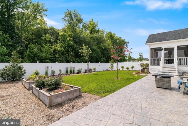 10104 Dressage Dr, Upper Marlboro, MD 20772 - view of patio with a vegetable garden and a sunroom